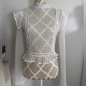 Gorgeous brand new condition lace embroidery ruffle sleeve top